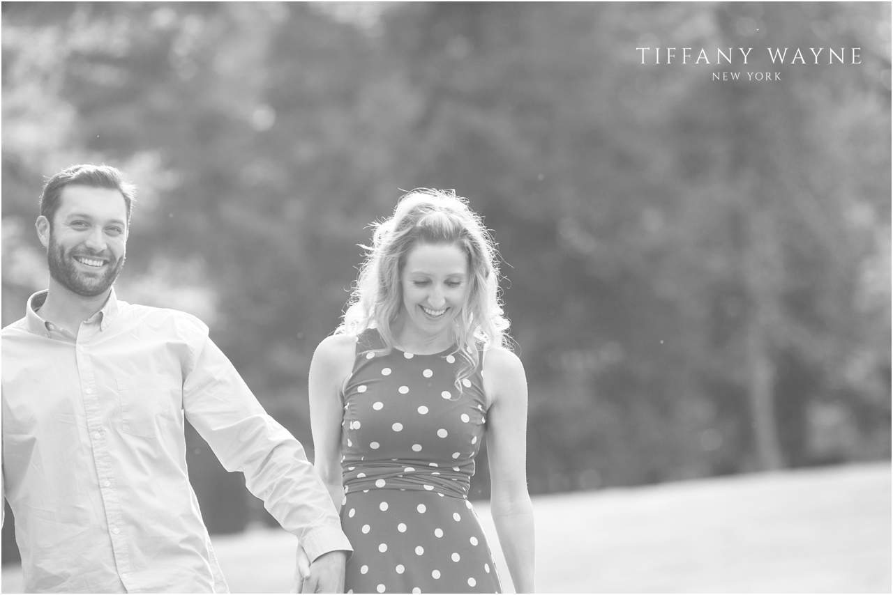 bride and groom smiling during Yaddo Gardens engagement session