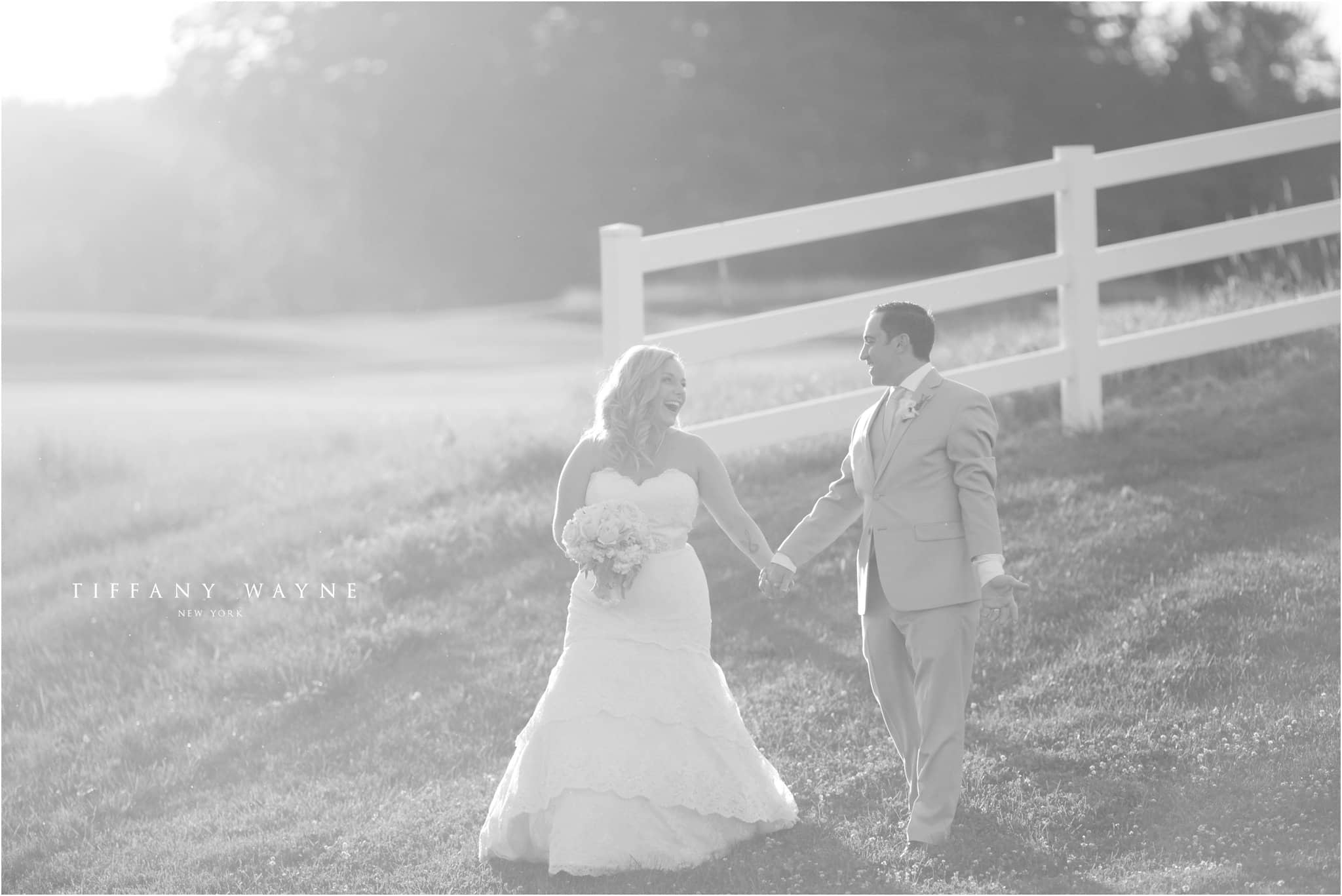Saratoga National walking in field wedding portrait