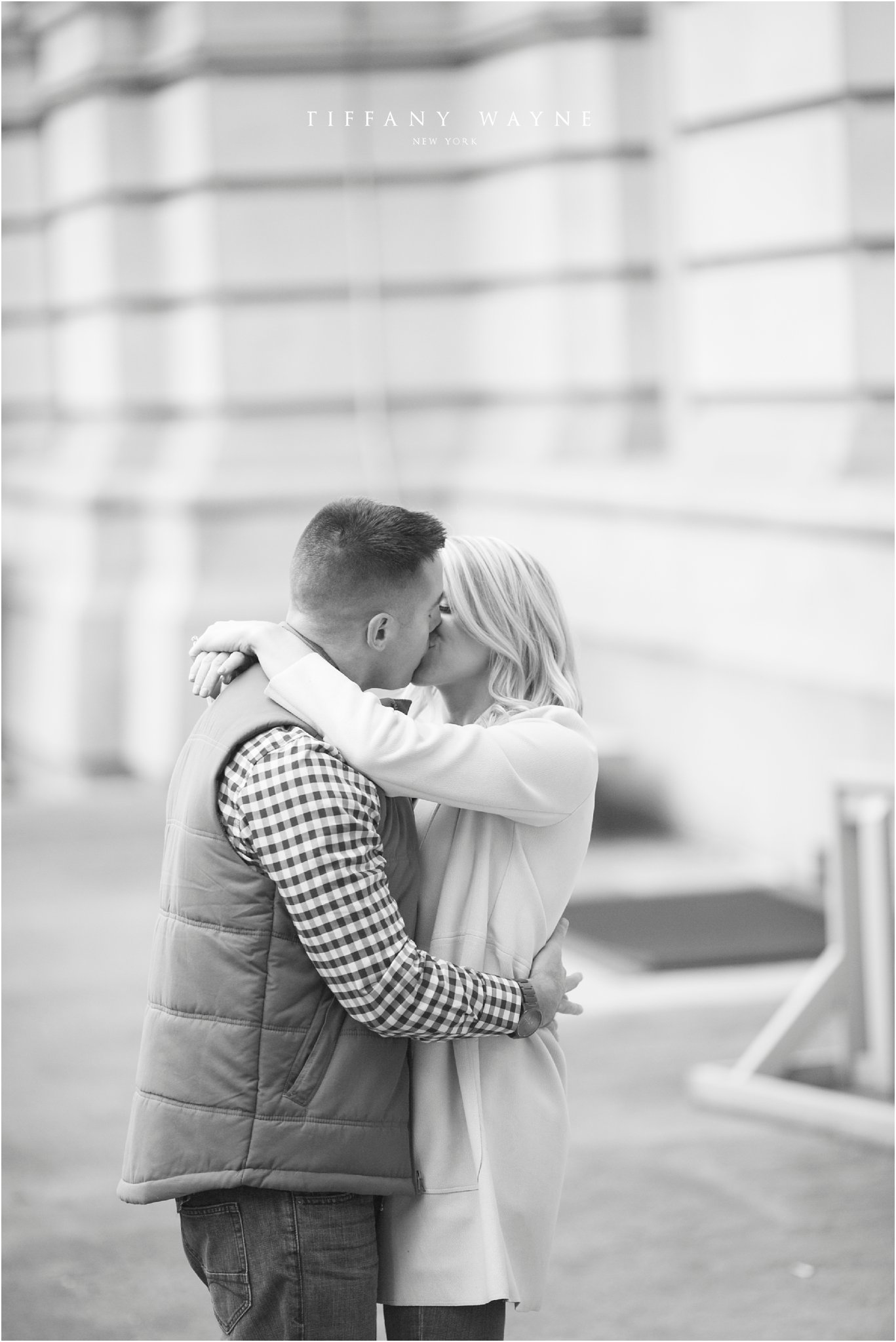 Franklin Plaza engagement session kissing in winter