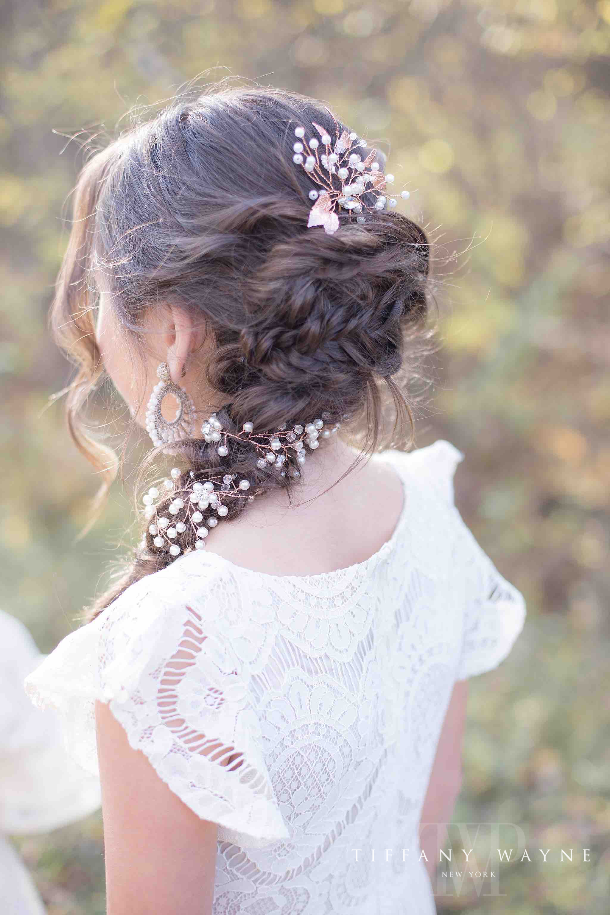 little girl with baby's breath in hair photographed by New York family photographer TIffany Wayne Photography