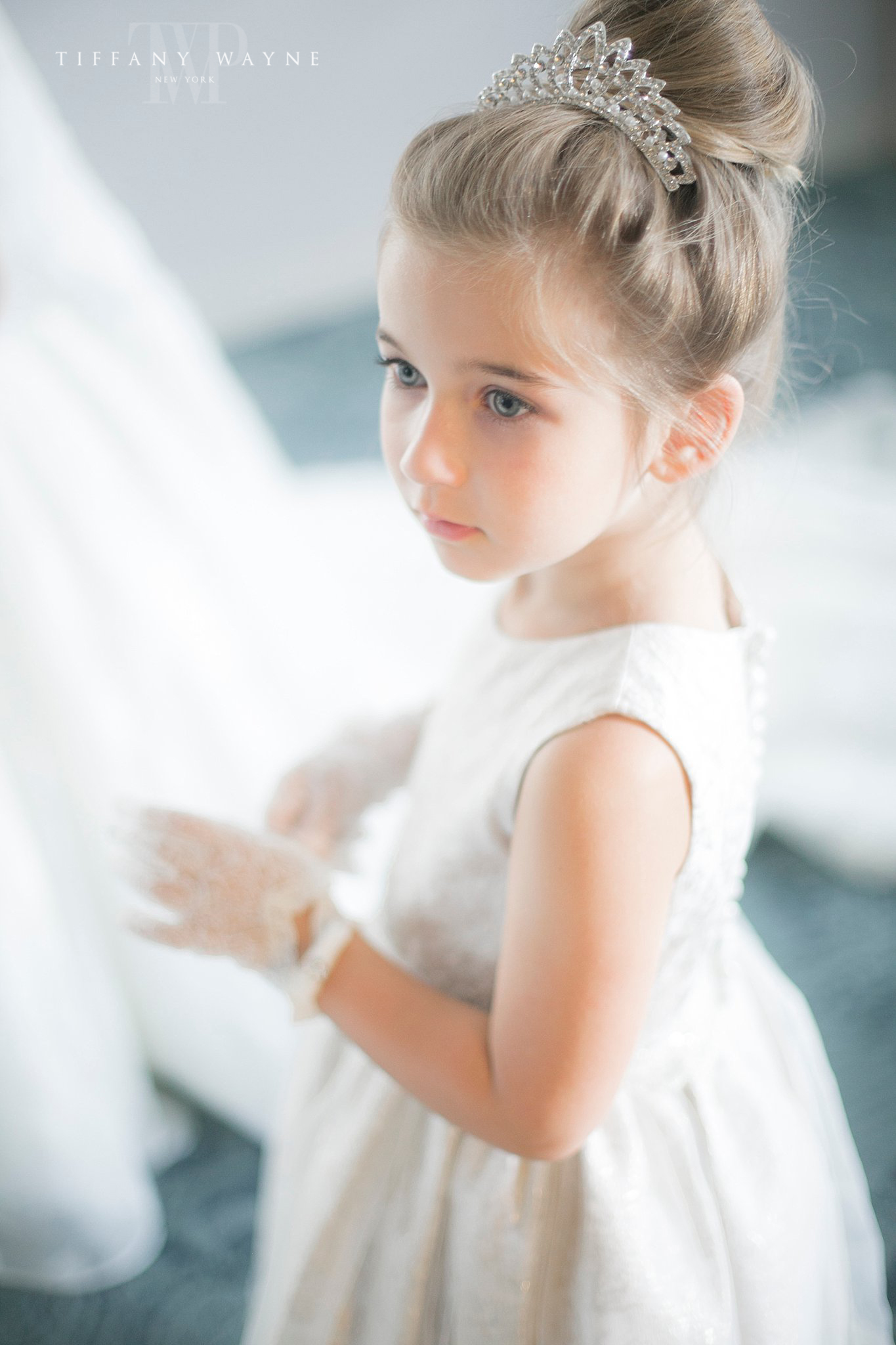 flower girl watches bride on Albany NY wedding day photographed by Tiffany Wayne Photography