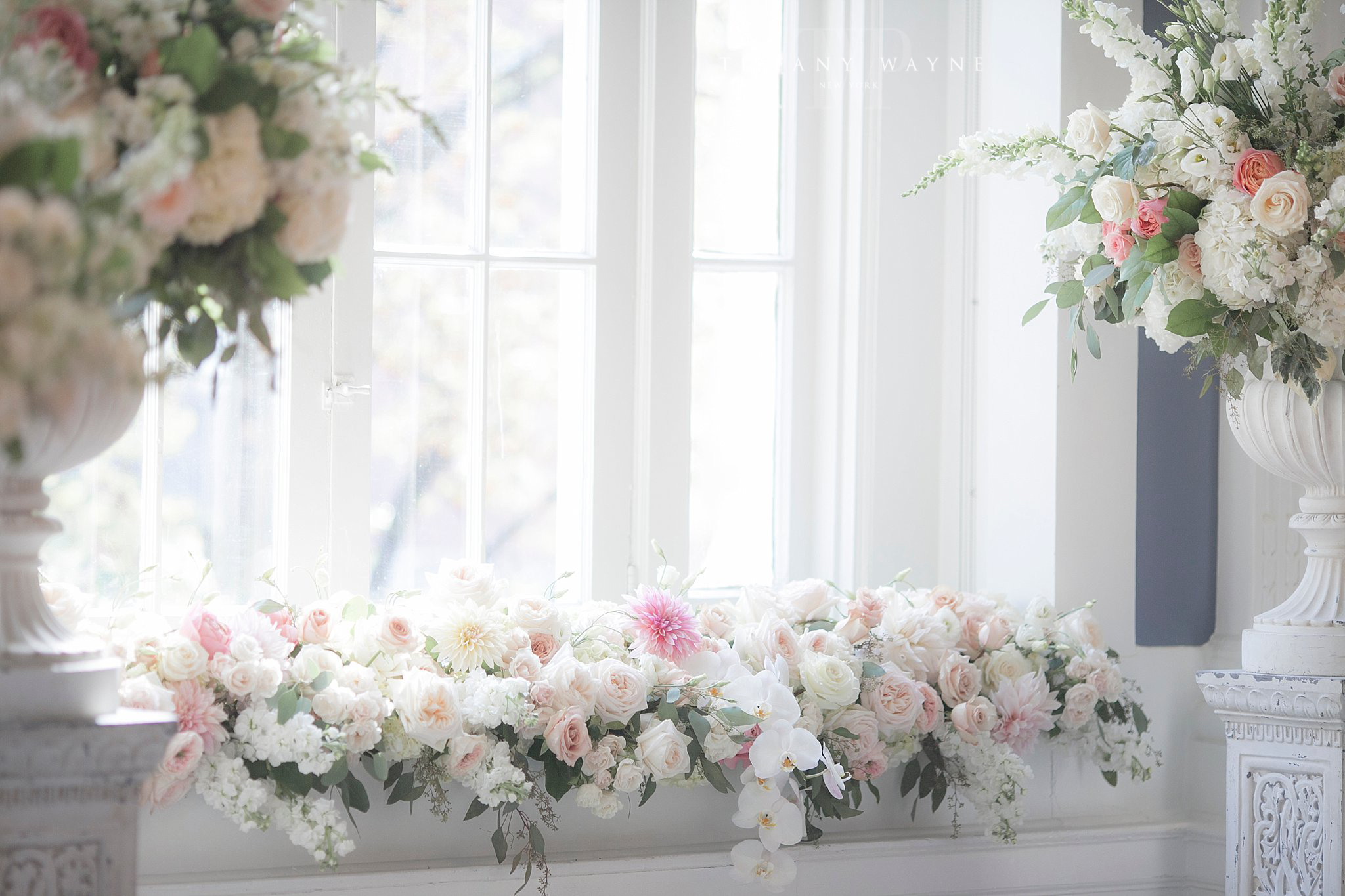 Tiffany Wayne Photography photographs Renaissance Floral Design arrangements for wedding ceremony