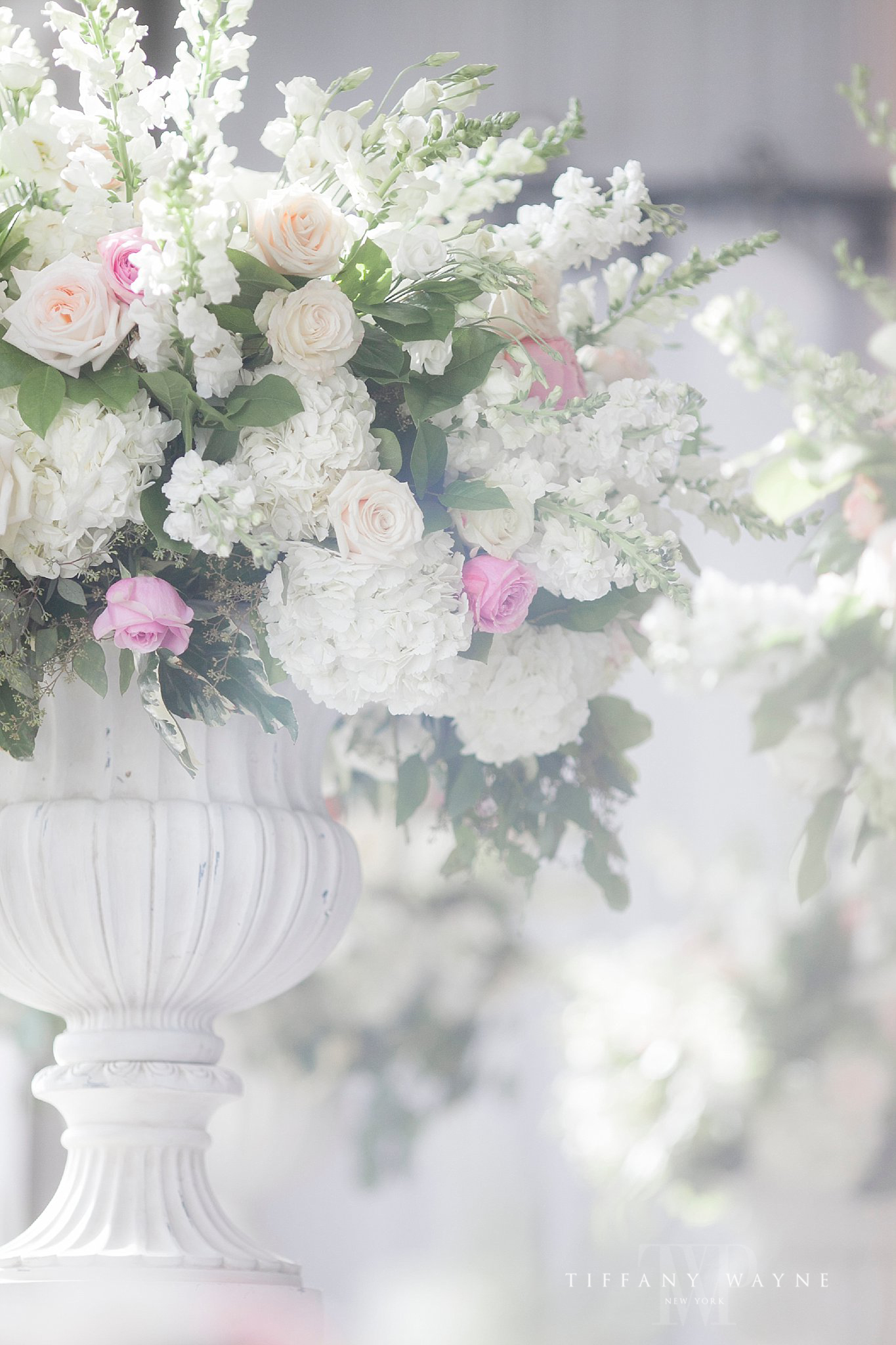 pastel floral arrangement for Renaissance Hotel wedding day photographed by Tiffany Wayne Photography