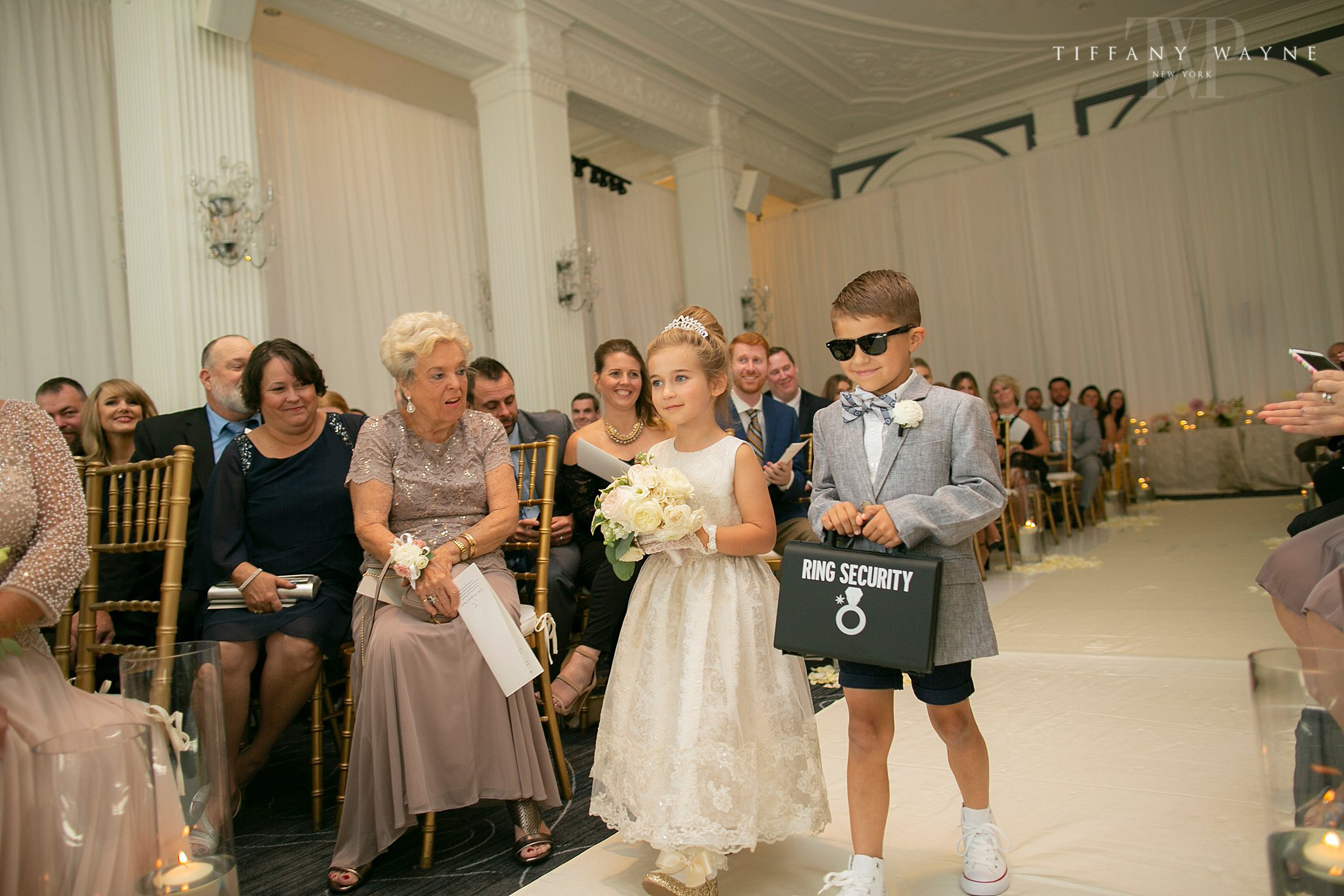 flower girl and ring bearer enter ceremony photographed by Tiffany Wayne Photography