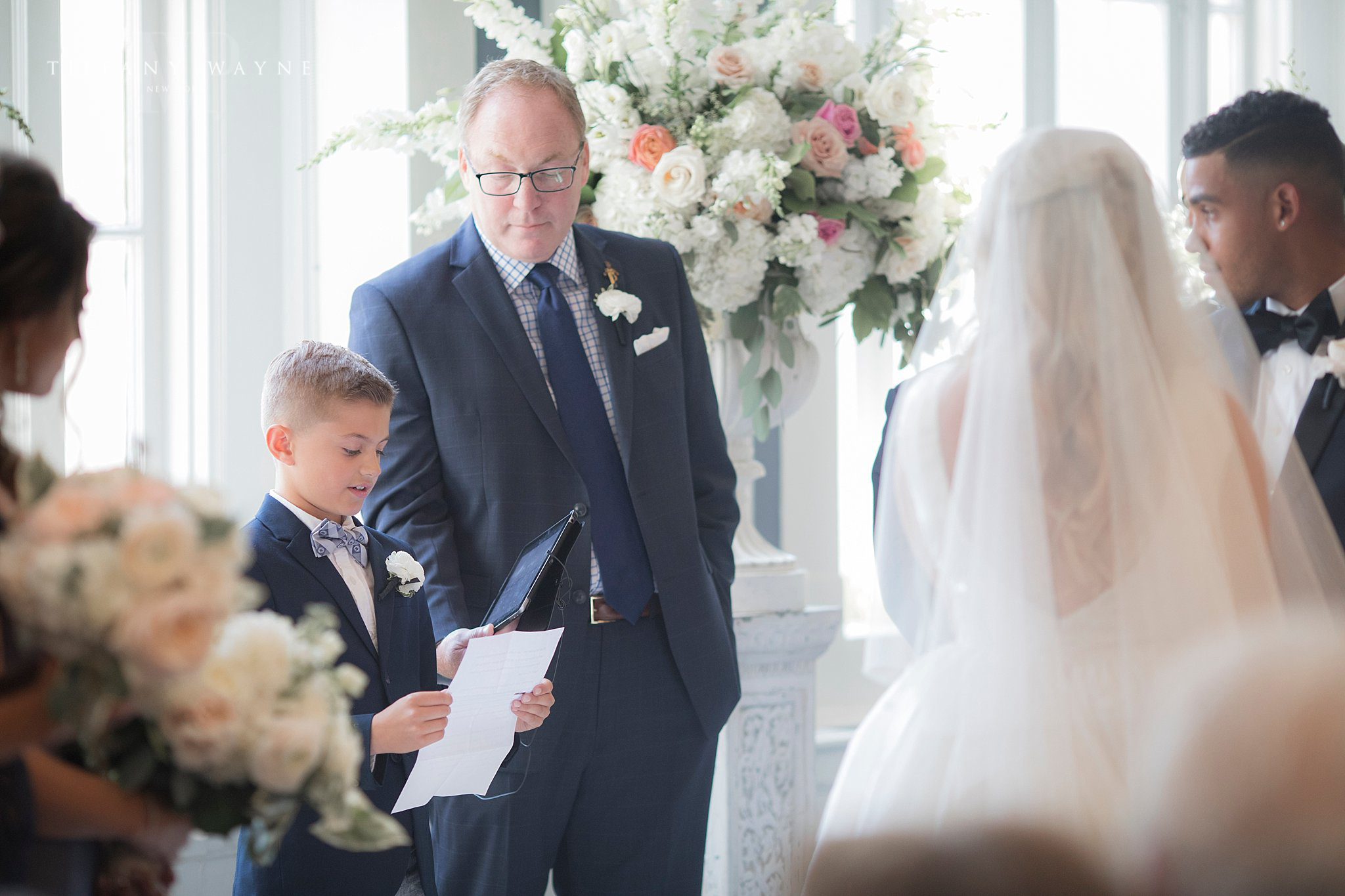 family member reads during NY wedding ceremony photographed by Tiffany Wayne Photography
