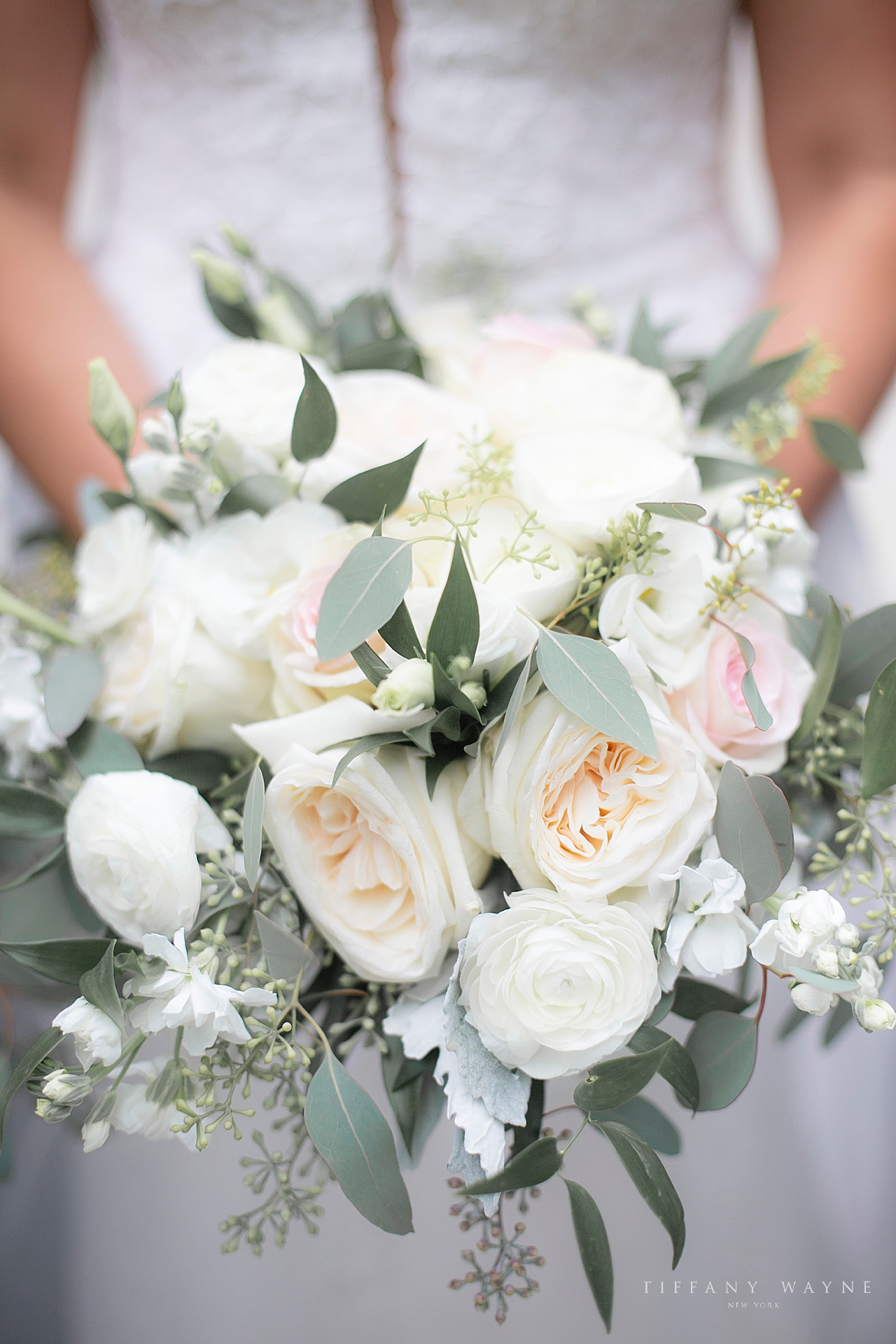 Ivory and blush wedding bouquet by Michele's Florist