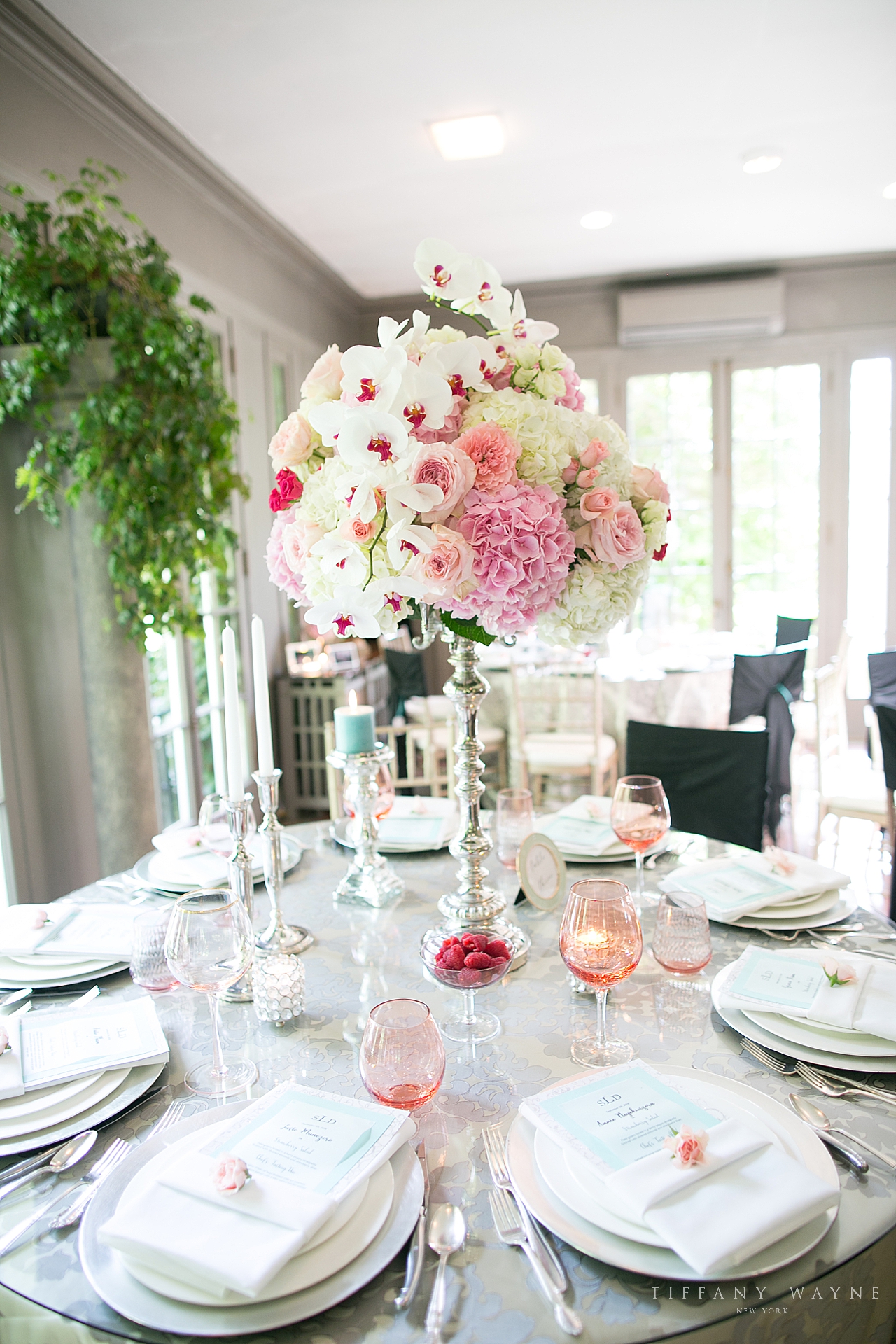 pink and ivory floral centerpieces at Lord Thompson Manor photographed by wedding photographer Tiffany Wayne Photography