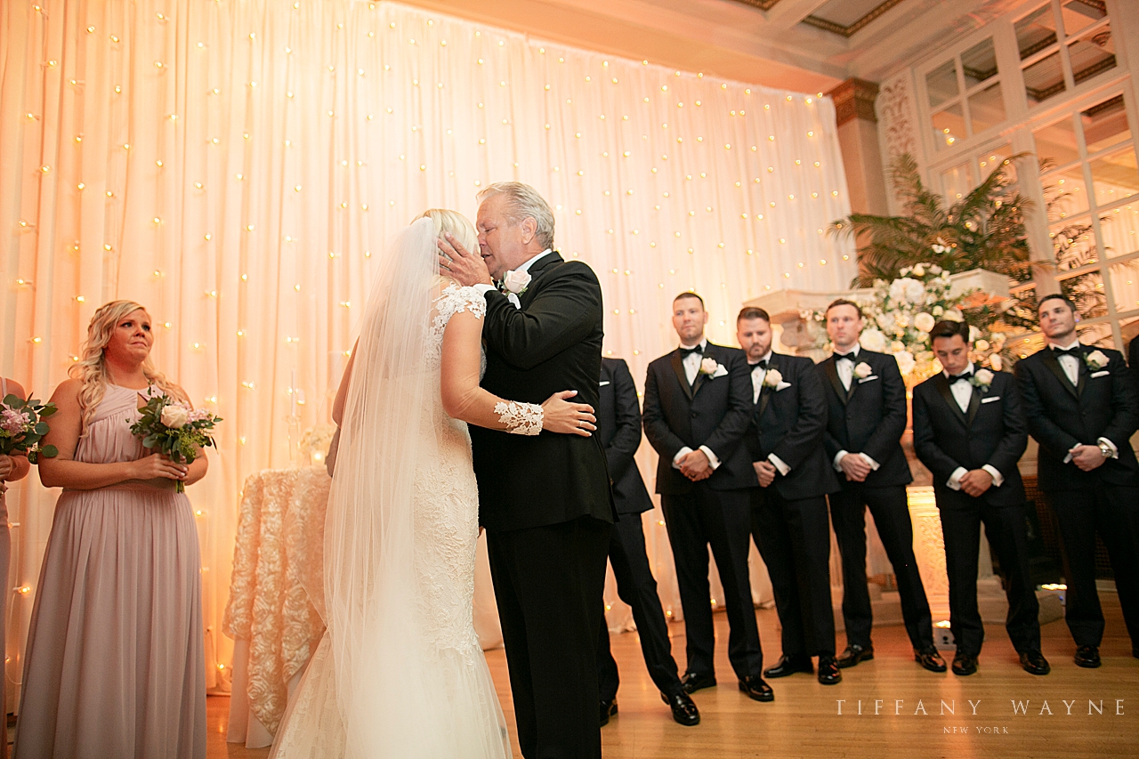 dad gives daughter away during Franklin Plaza Inn wedding photographed by wedding photographer Tiffany Wayne Photography