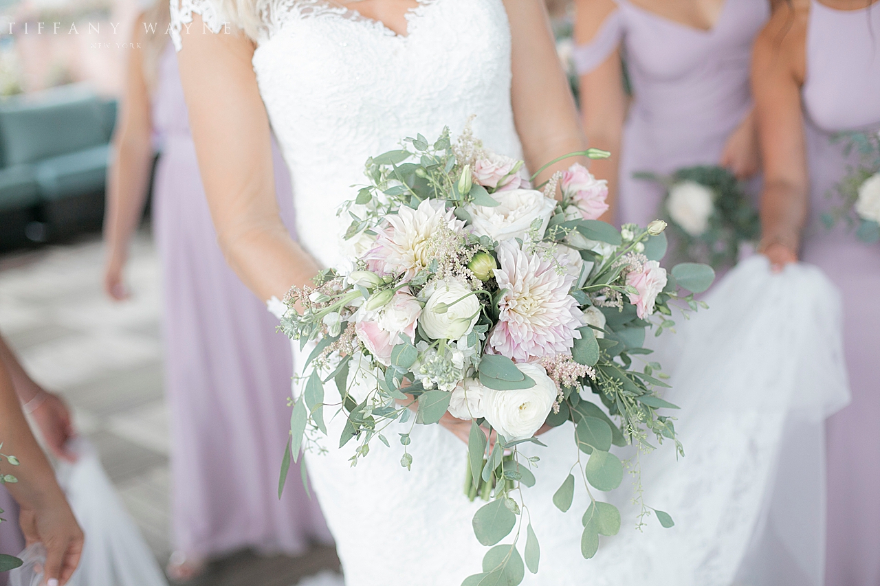 purple and white bridal bouquet photographed by wedding photographer Tiffany Wayne Photography