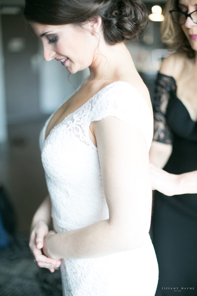 bride gets ready for wedding day photographed by wedding photographer Tiffany Wayne