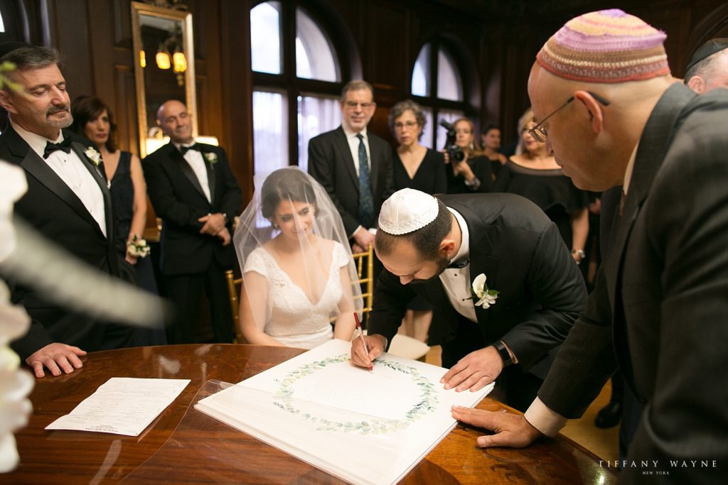 Ketubah wedding ceremony photographed by Tiffany Wayne, New York wedding photographer